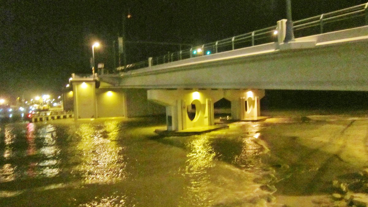 The drawbridge at night.