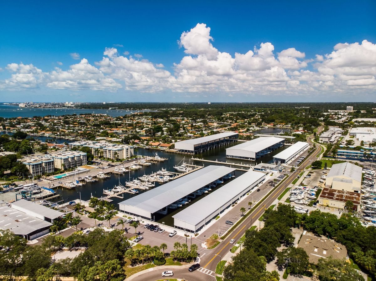 Aerial view of the covered slip rows and floating docks at Maximo Marina, St. Petersburg, Florida.