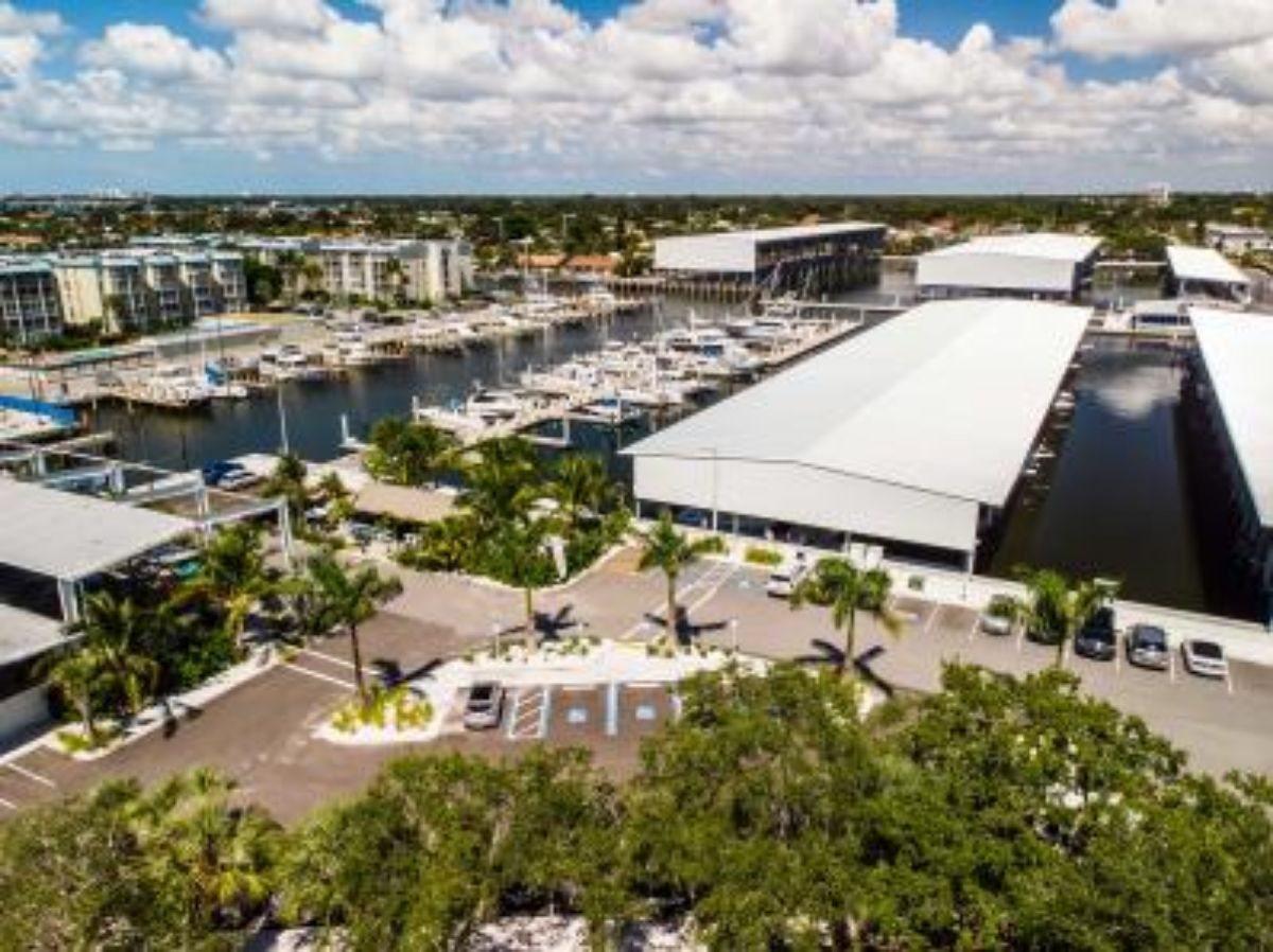 The basin at Maximo Marina seen from above, with boats berthed along the floating docks.